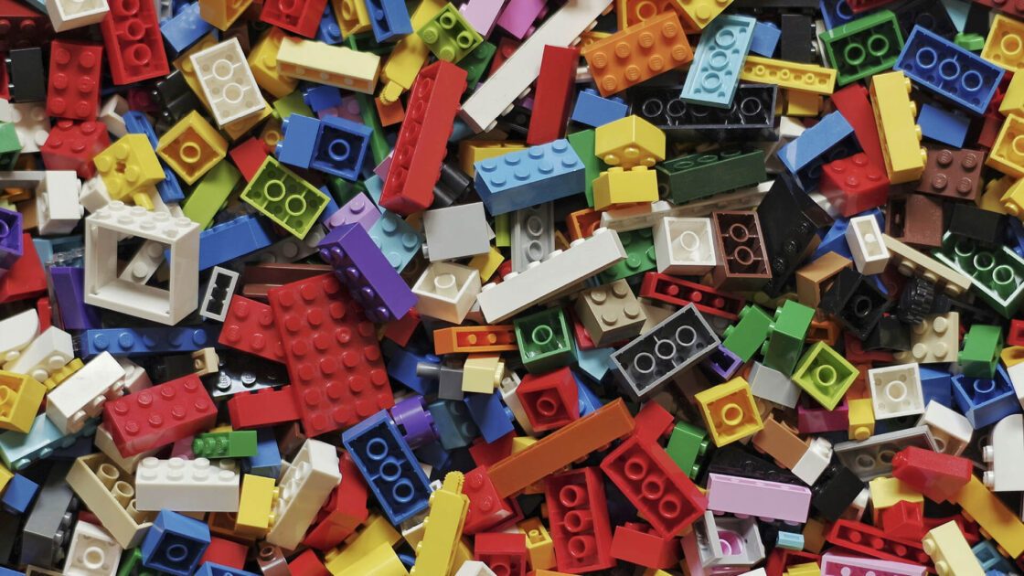 A jumble of colorful plastic building blocks.