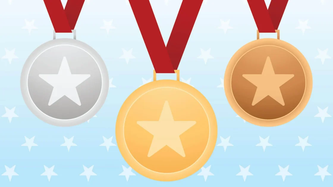 Gold, silver, and bronze medals with stars on red ribbons, against a blue starry background.