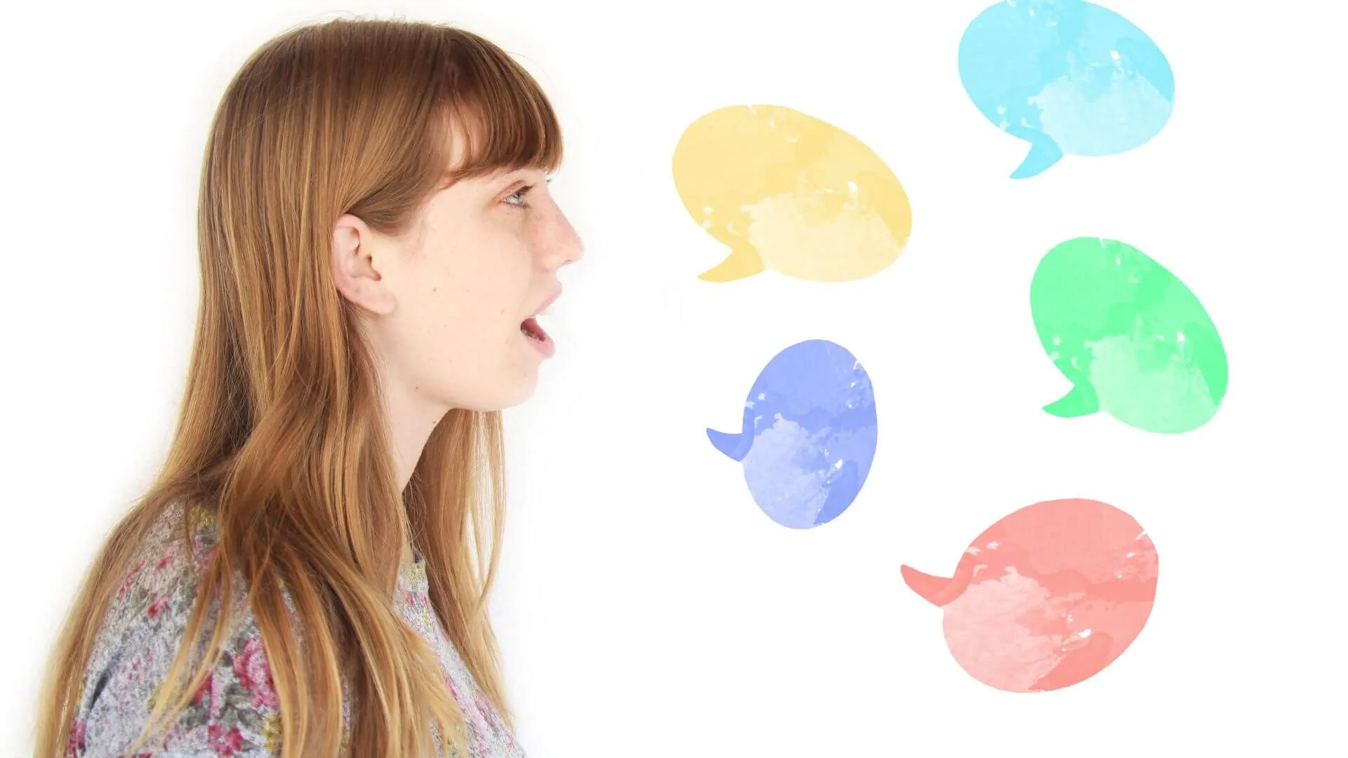 Woman in profile with open mouth speaking towards five colorful watercolor speech bubbles.