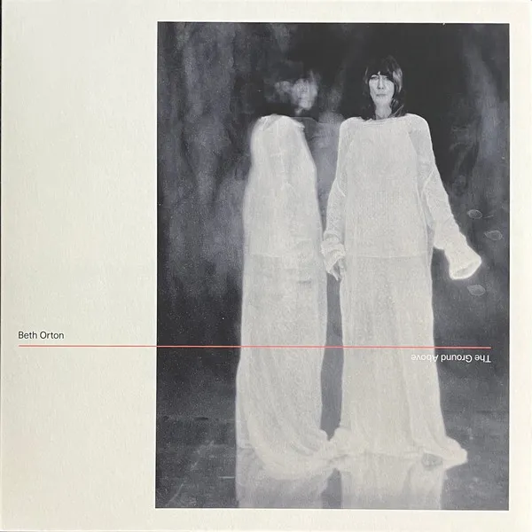 Beth Orton, 'The Ground Above' album cover: B&W image of a woman in white with a ghostly double.