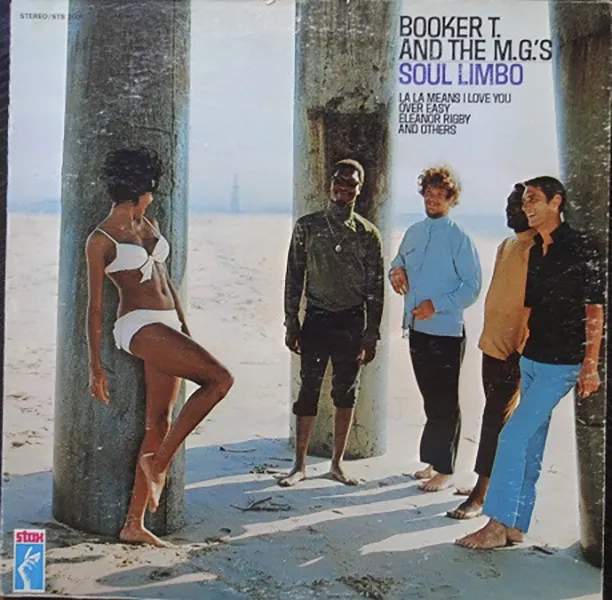 Booker T. & The M.G.'s Soul Limbo album cover. Woman in white bikini, four men on beach by a pier.