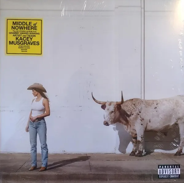 Kacey Musgraves stands next to a longhorn on this album cover for "Middle of Nowhere."